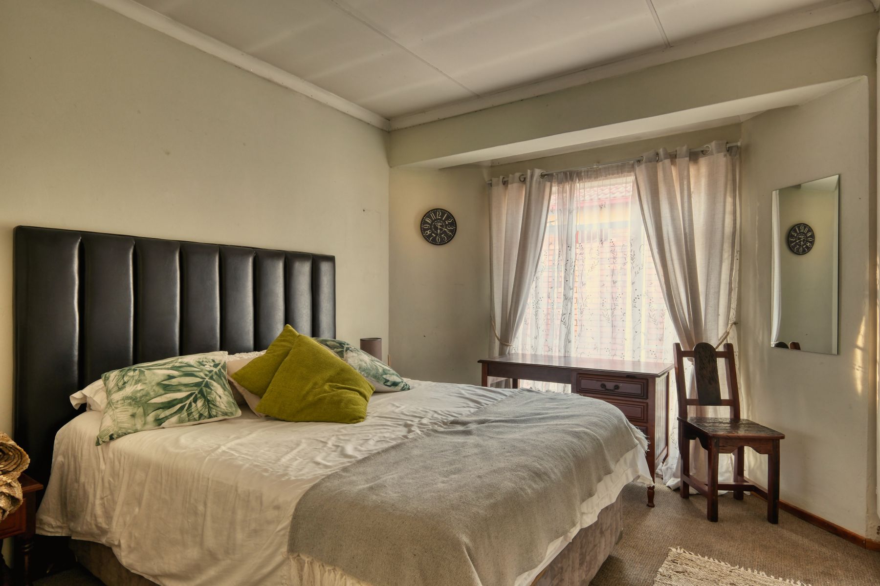 Comfortable bed in a guest room